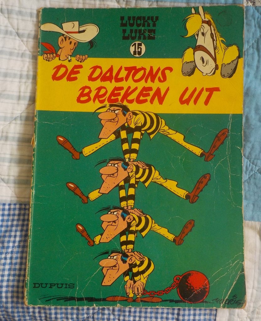 Lucky Luke 15 - De Daltons breken uit (Dupuis) 1966, Gelezen, Eén stripboek, Ophalen of Verzenden, Morris