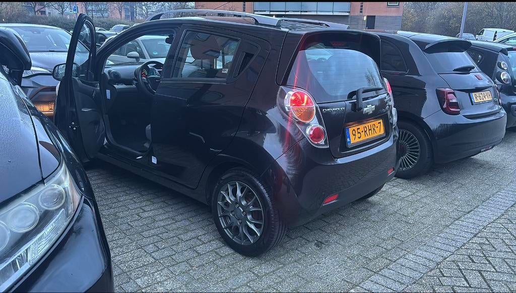 Chevrolet Spark 1.0 Bifuel 2011 Zwart, Ophalen of Verzenden, Chevrolet, Achterklep