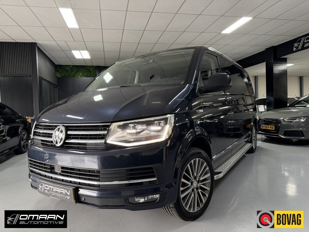 Volkswagen Transporter 2.0 TDI T6 Caravelle Highline lang Ds, Auto's, Volkswagen, Automaat, 15 km/l, Gebruikt, Blauw