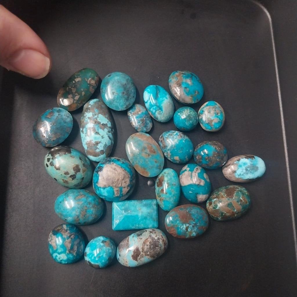 Lot met verschillende Iraanse turkoois cabochons, Ophalen of Verzenden, Staal