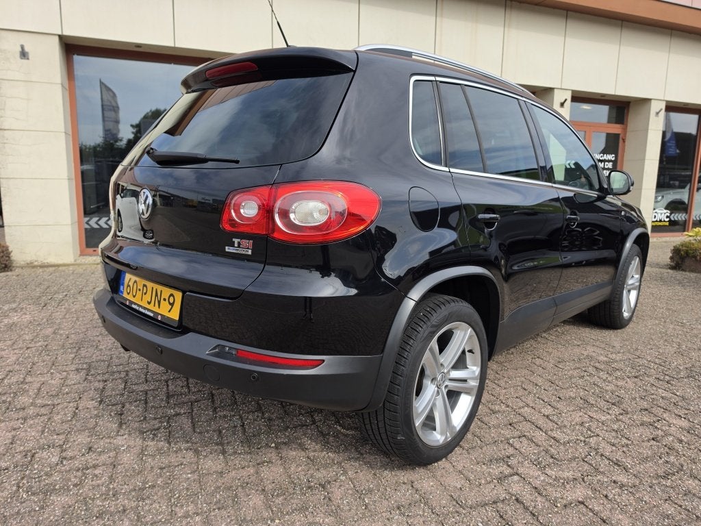 Volkswagen Tiguan 1.4 TSI Sport & Style | Park Assist | airc, Auto's, Keurmerk '100% Onderhouden', 4 cilinders, Zwart, Origineel Nederlands