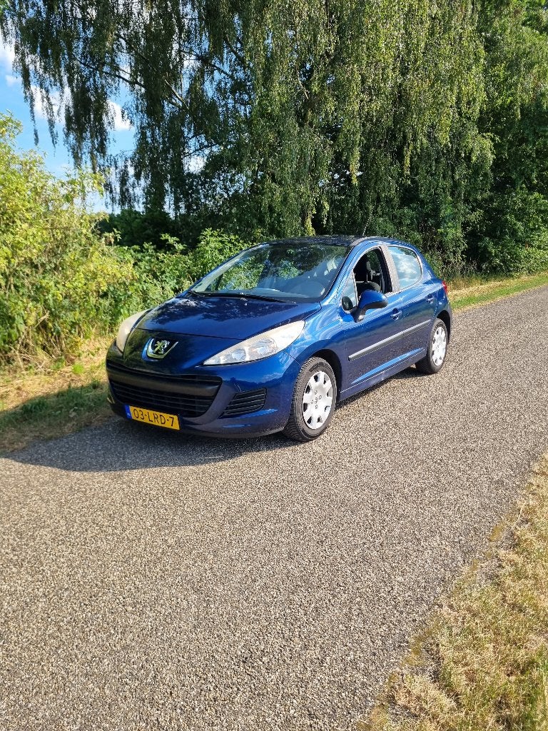 Peugeot 207 1.4 VTI 16V 5DRS 2010 Blauw, Auto's, Voorwielaandrijving, Stof, Zwart, Blauw
