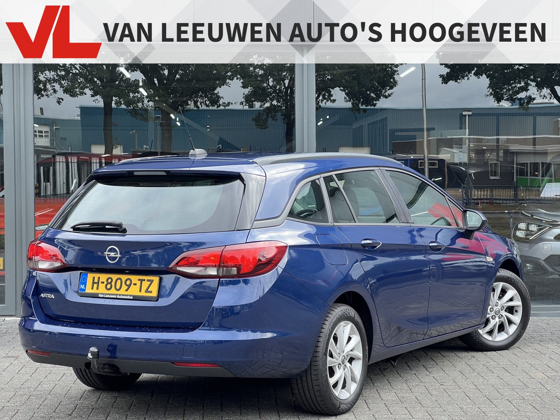 Opel Astra Sports Tourer 1.2 Edition | Navi | Trekhaak | RIJ, Auto's, Voorwielaandrijving, Stof, Euro 6, 1199 cc