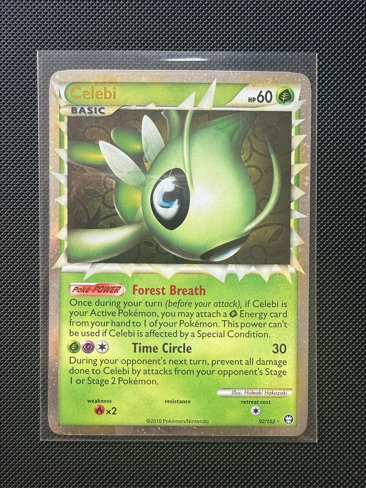 Pokémon Kaart Celebi (92/102) - HeartGold & SoulSilver, Hobby en Vrije tijd, Ophalen of Verzenden, Zo goed als nieuw, Losse kaart