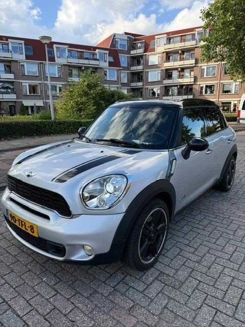 Mini Countryman 1.6 184pk All4 Aut. 2012 Grijs, Auto's, Dealer onderhouden, 1380 kg, Bluetooth, Zwart