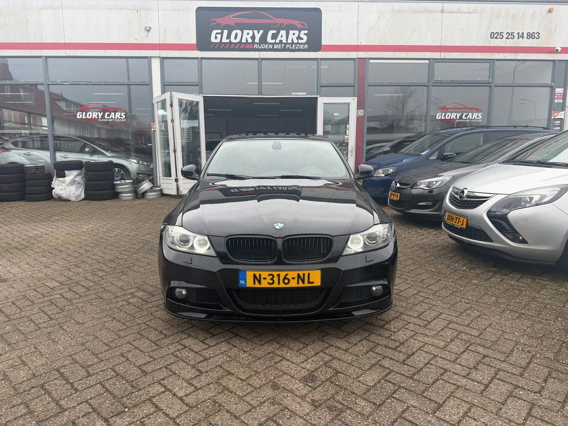 BMW 3-serie 335i AUTOMAAT-LEER-PDC-NAVI-CRUISE, Euro 5, Achterwielaandrijving, Zwart, Leder