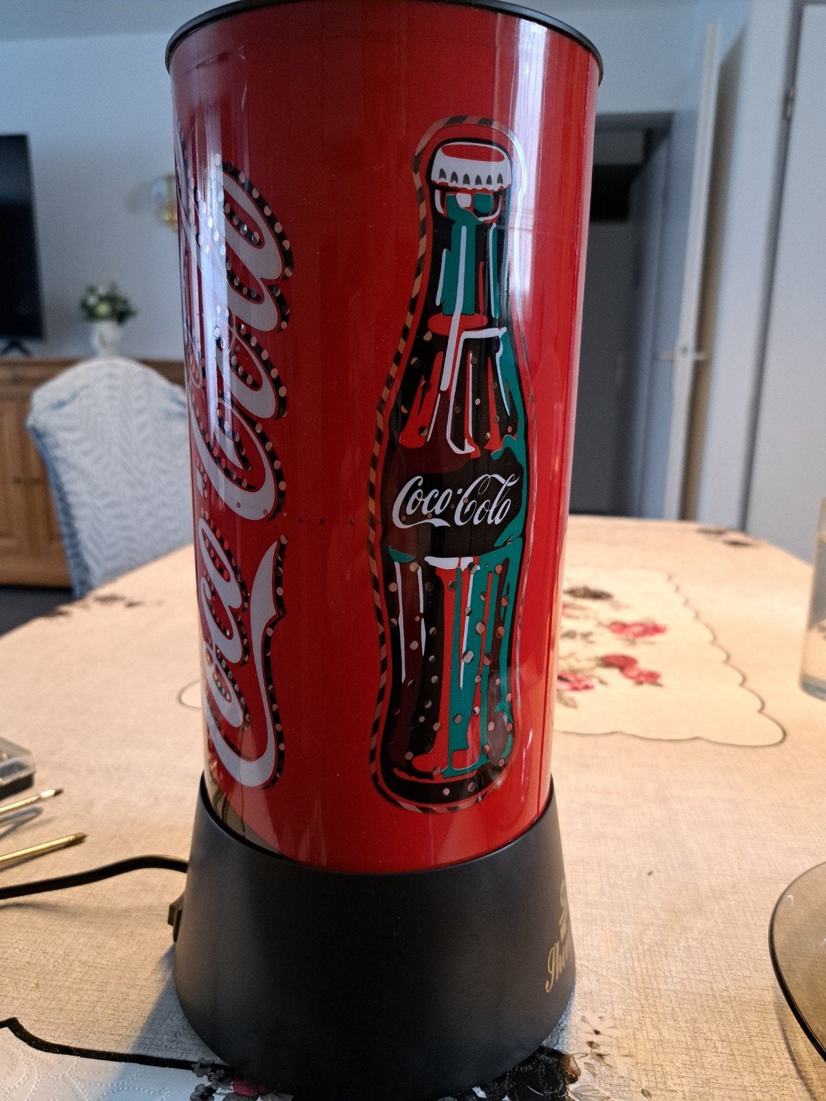 Coca cola lamp, Ophalen