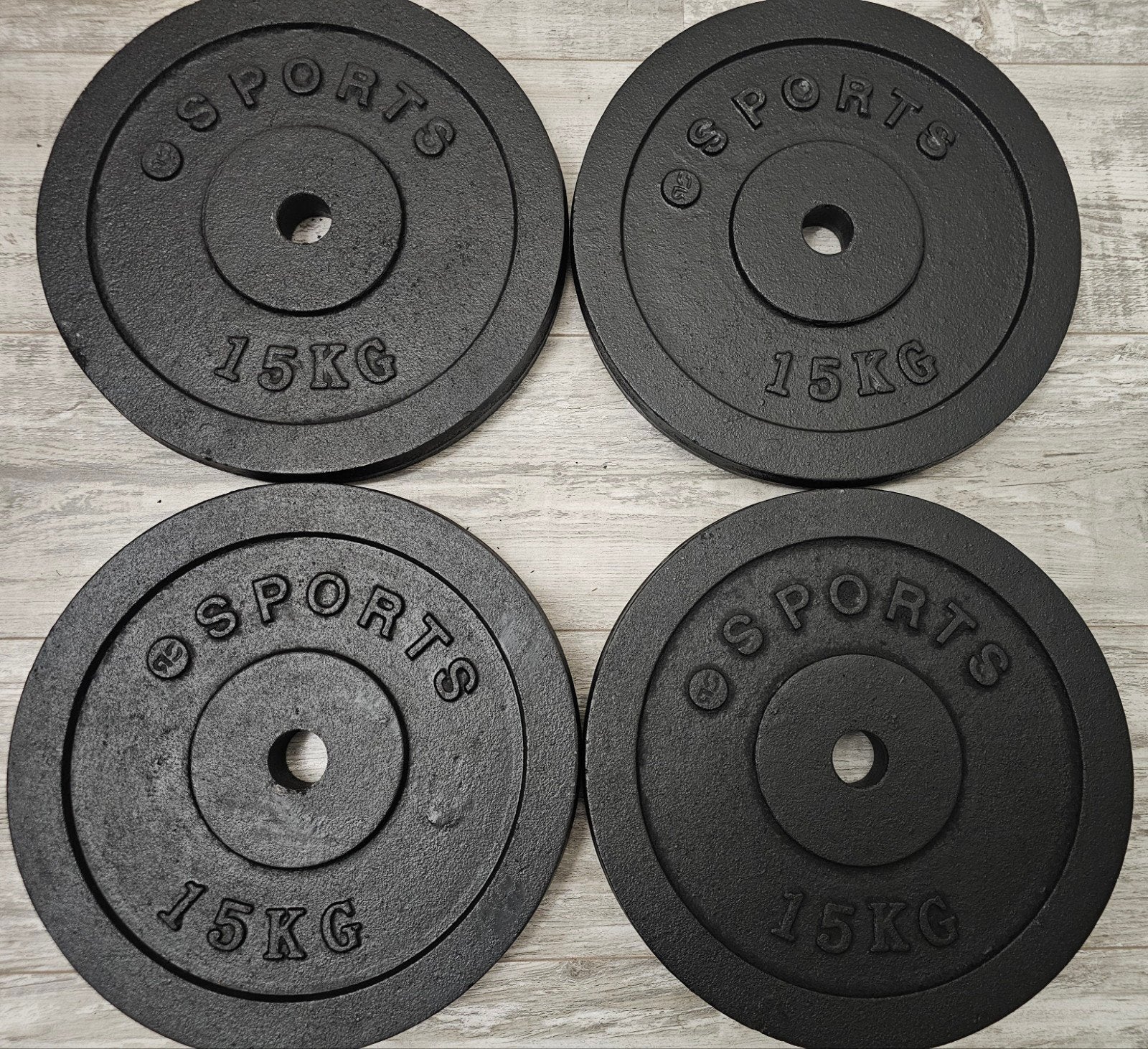 Halterschijven 4x15kg totaal 60kg gietijzer 30mm Nieuw!, Ophalen, Zo goed als nieuw