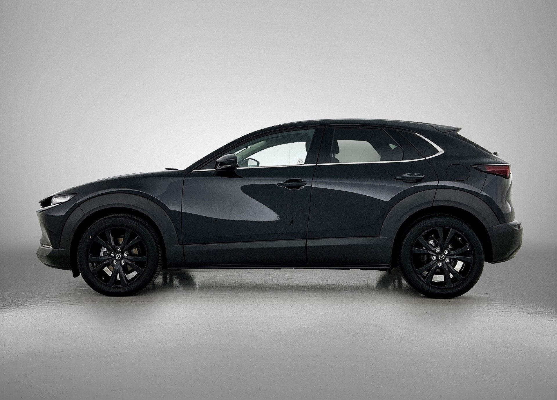 Mazda CX-30 2.5 e-SkyActiv-G M Hybrid Homura Navigatie | Ele, 12 maanden, Gebruikt, 4 cilinders, Zwart