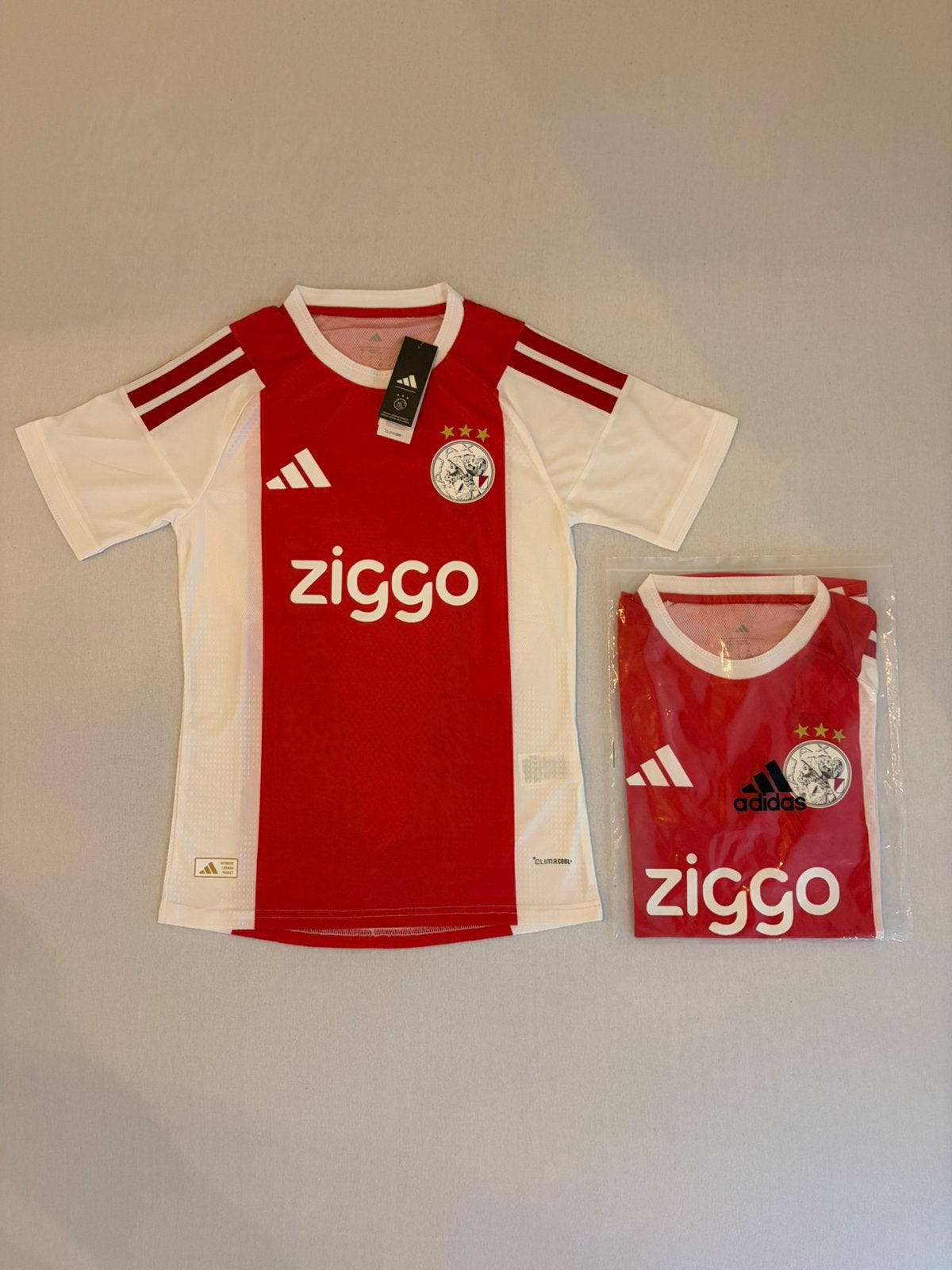 Nieuw Ajax thuis shirt rood/wit 2026-2027 in alle maten!, Kleding | Heren, Nieuw, Overige maten, Ophalen of Verzenden, Voetbal