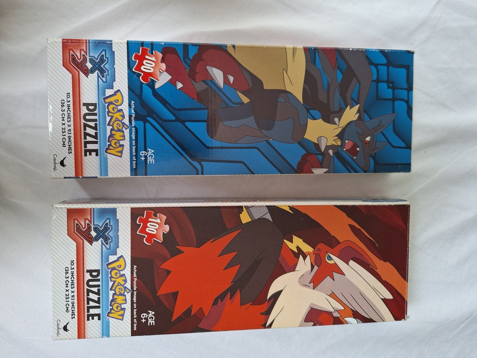 2x Pokémon X & Y Puzzel 100 stukjes - Lucario & Blaziken, Ophalen of Verzenden, Meer dan 50 stukjes, Gebruikt, 6 jaar of ouder