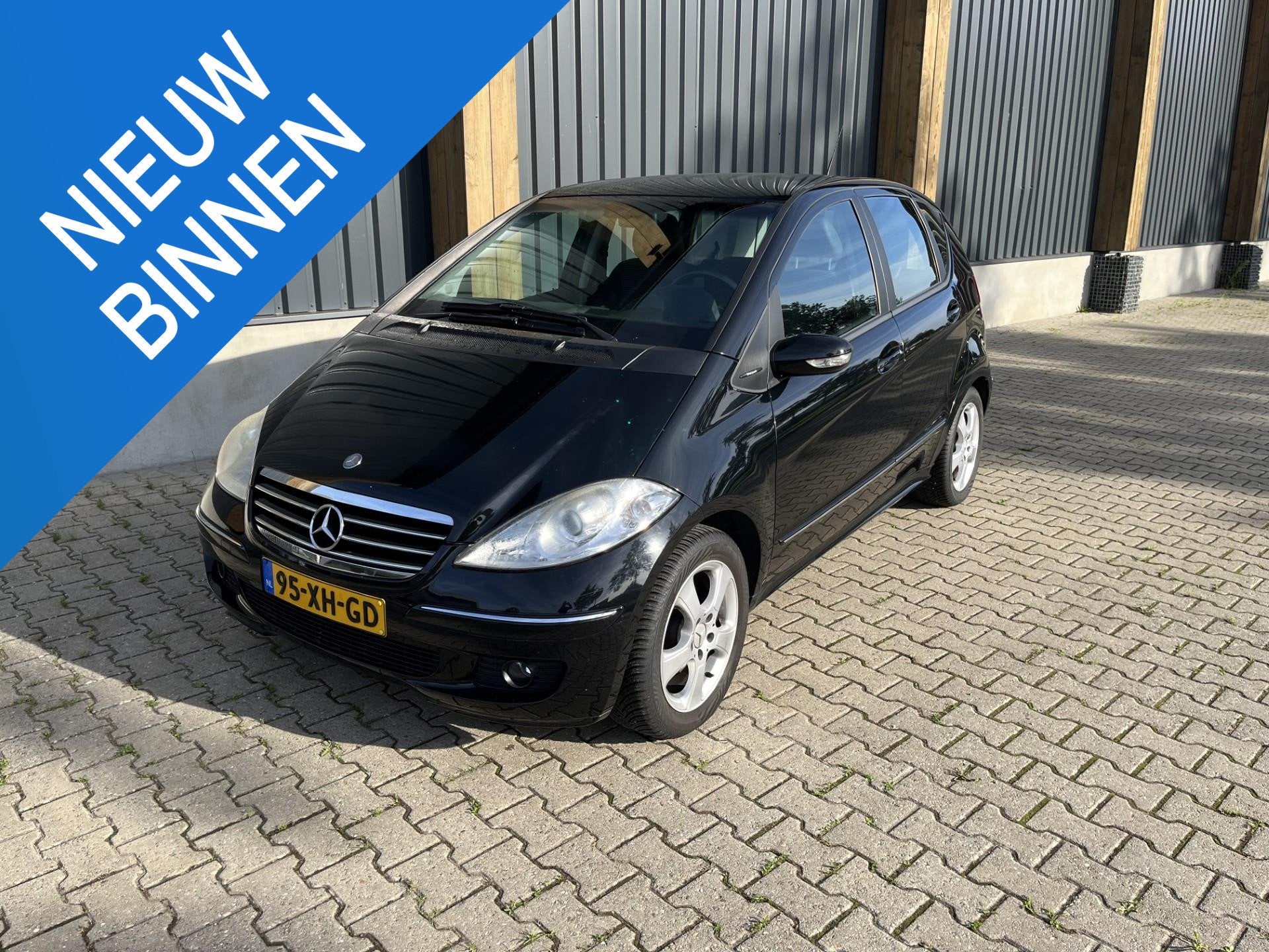 Mercedes-Benz A-klasse 150 Avantgarde, Voorwielaandrijving, 15 km/l, Zwart, Leder en Stof