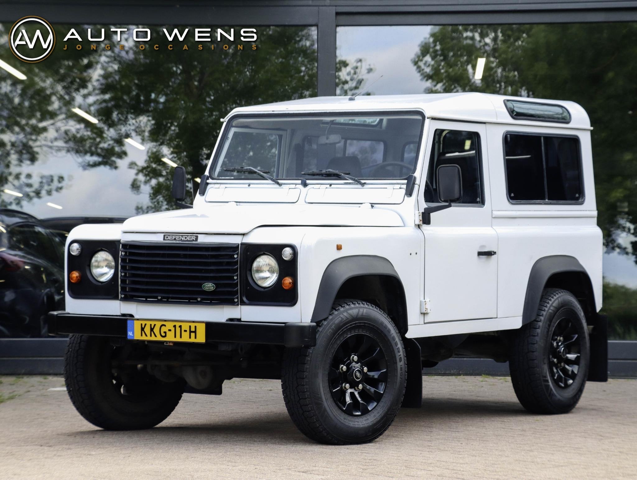 Land Rover Defender 90 2.0 MPI Benzine, Auto's, Land Rover, Gebruikt, 4 cilinders, Wit, Handgeschakeld