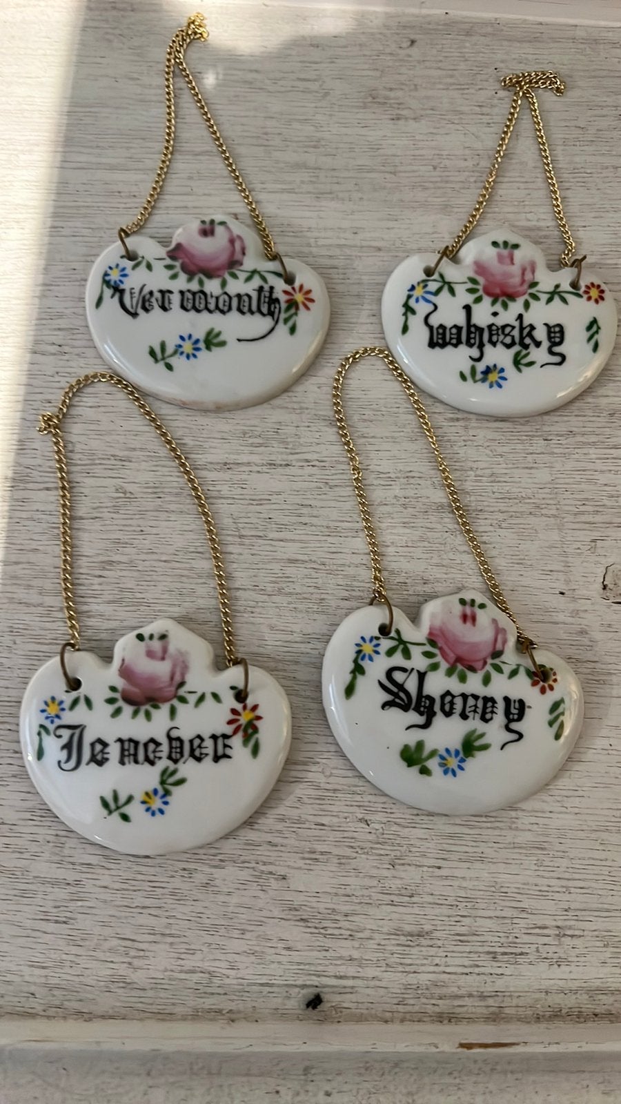 4 Vintage karafhanger porselein Sherry-Jenever- Vermo-Whisky