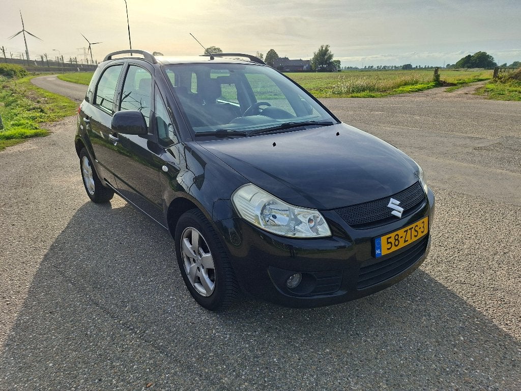 Suzuki SX4 1.5 2007 Zwart Airco, Auto's, Voorwielaandrijving, 4 cilinders, 1490 cc, Handgeschakeld