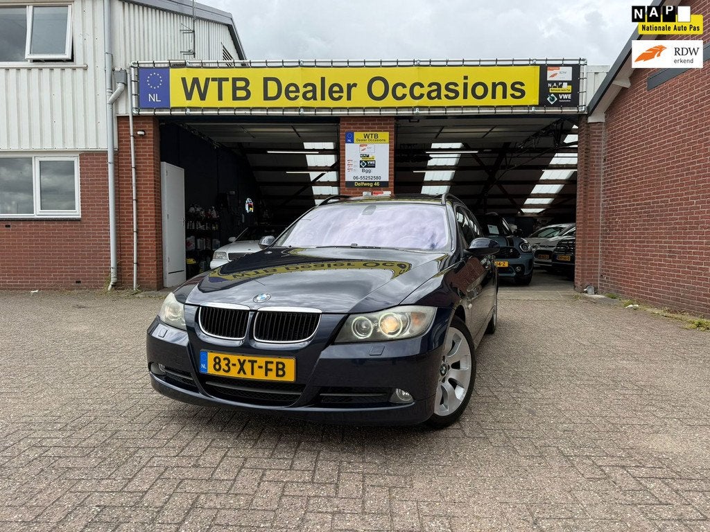BMW 3-serie Touring 320i High Executive Dealer oh. Trekhaak,, Automaat, Achterwielaandrijving, Zwart, 4 cilinders