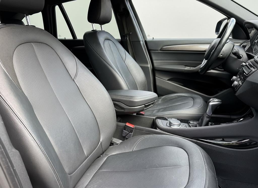 BMW X1 xDrive20i 192pk High Executive, Camera | Trekhaak | X, Auto's, BMW, 1998 cc, Gebruikt, Euro 6, 2000 kg