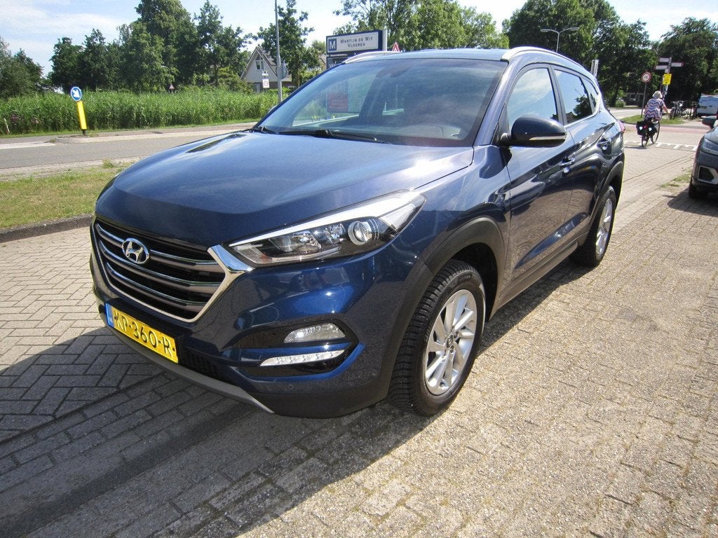 Hyundai Tucson 1.6 GDi Comfort Navi, Auto's, Voorwielaandrijving, Stof, Gebruikt, 4 cilinders