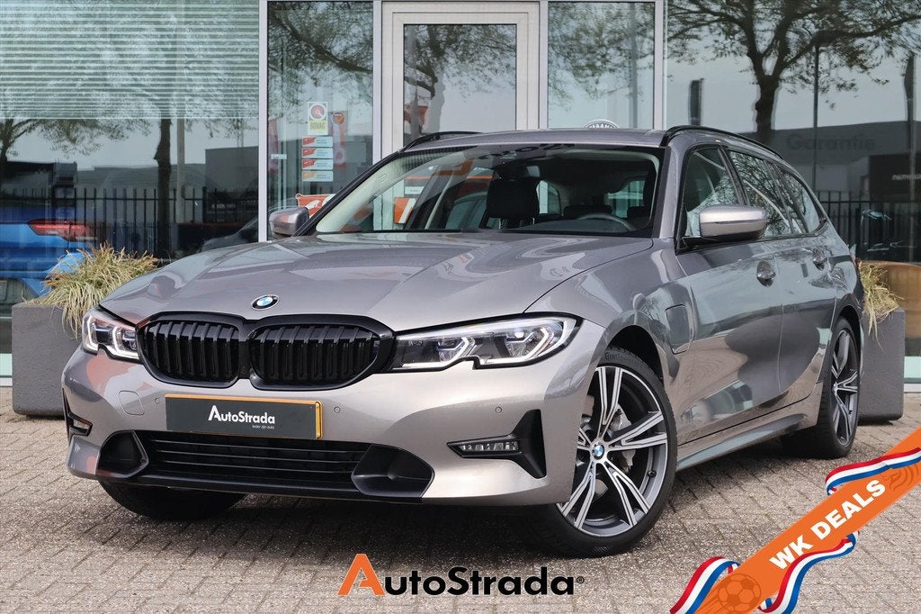 BMW 3-Serie Touring (g21) 330e High Executive 292pk | Leder, Auto's, BMW, 1998 cc, Regensensor, Gebruikt, 4 cilinders