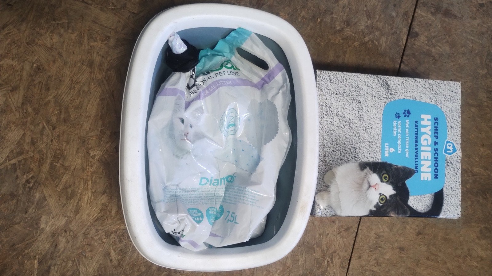 Toilet kat kattenbak, Ophalen