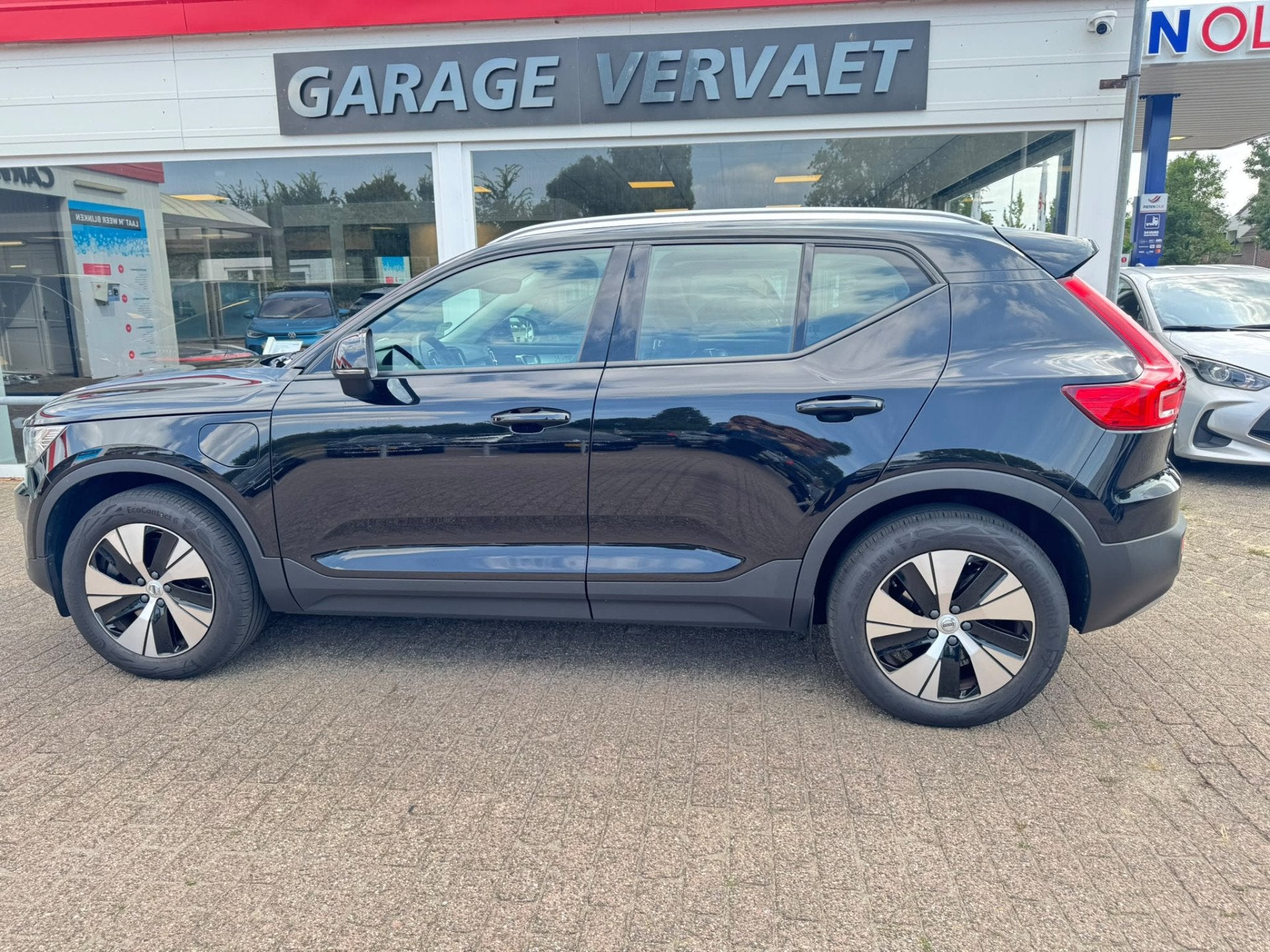 Volvo XC40 1.5 T5 Twin Engine Momentum Pro (bj 2020), Auto's, Automatische klimaatregeling, 1712 kg, Leder en Stof, Zwart