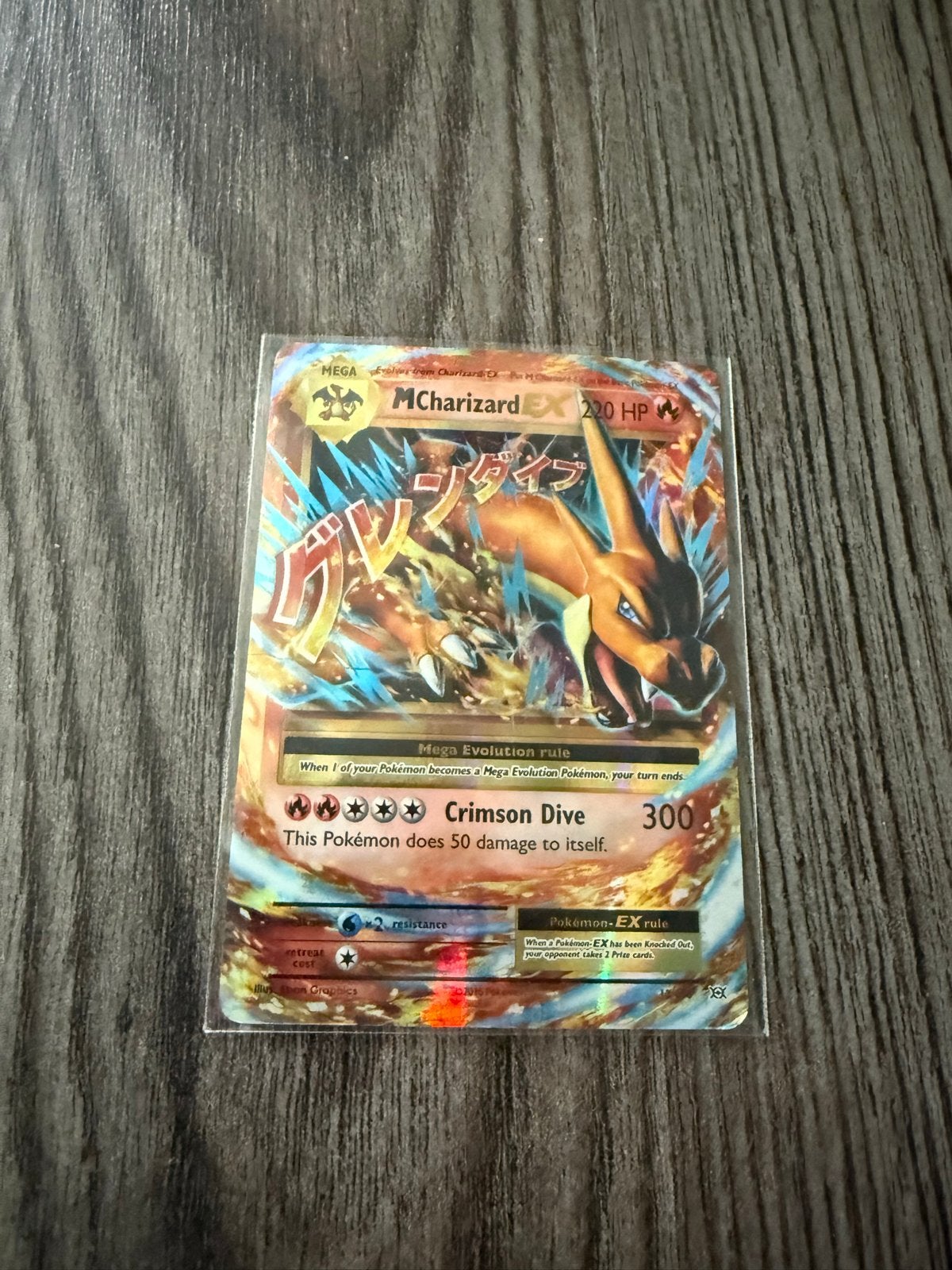 Pokémon M Charizard EX Kaart - Zeldzaam en in Topstaat, Ophalen of Verzenden, Zo goed als nieuw, Losse kaart