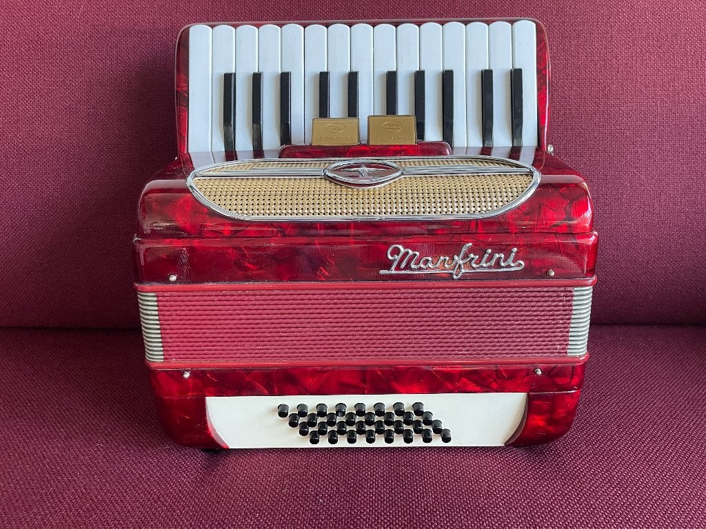 Kleine italiaanse Manfrini accordeon .32 bas .Top ., Overige merken, Gebruikt, 32-bas, Met koffer