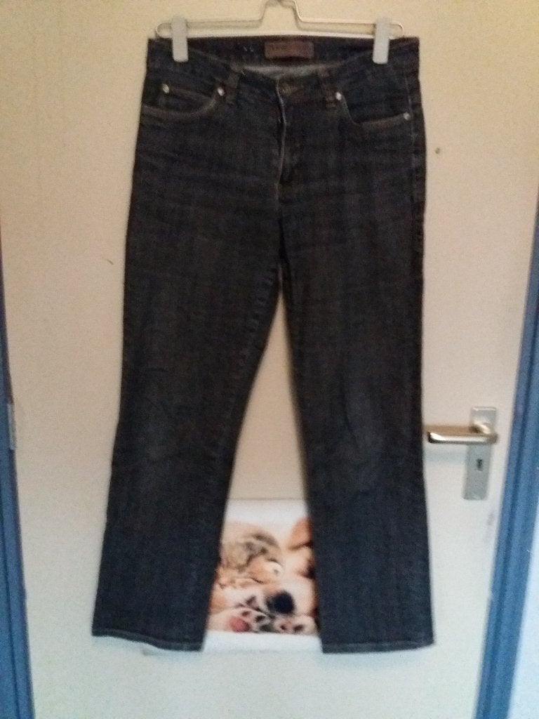 Een donker-blauwe stretch spijker-broek., Blauw, Ophalen of Verzenden, Zo goed als nieuw, W28 - W29 (confectie 36)