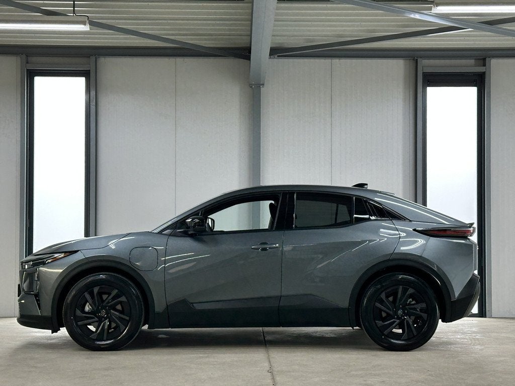 Toyota C-HR+ First Edition 77 kWh | Navi | Acc | Camera | el, Auto's, Toyota, 12 maanden, Stof, Gebruikt, SUV of Terreinwagen