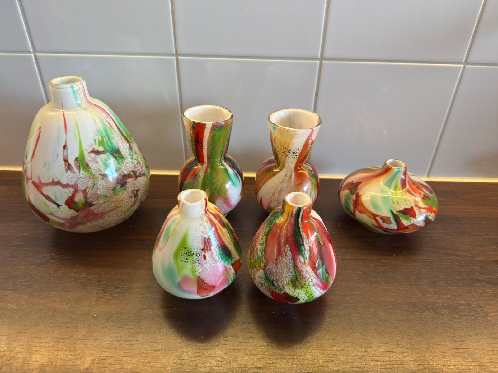Set fidrio vazen, Ophalen