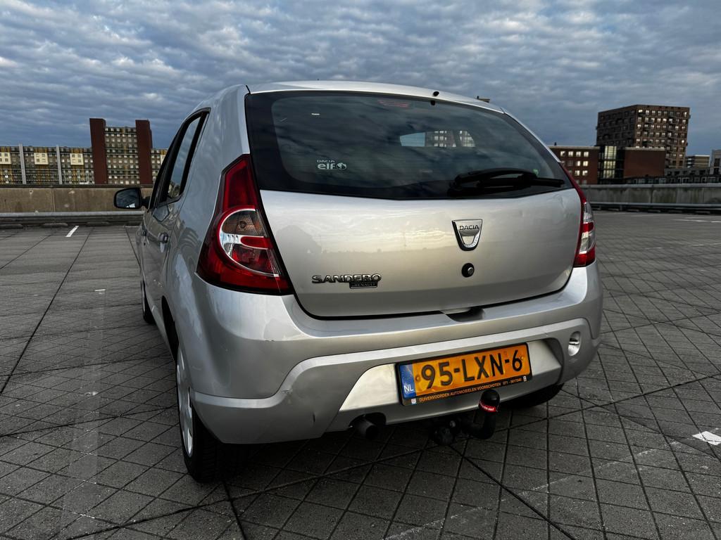 Dacia Sandero 1.2 Lauréate AIRCO 1STE EIGENAAR TREKHAAK NAP, Voorwielaandrijving, Stof, Gebruikt, Origineel Nederlands