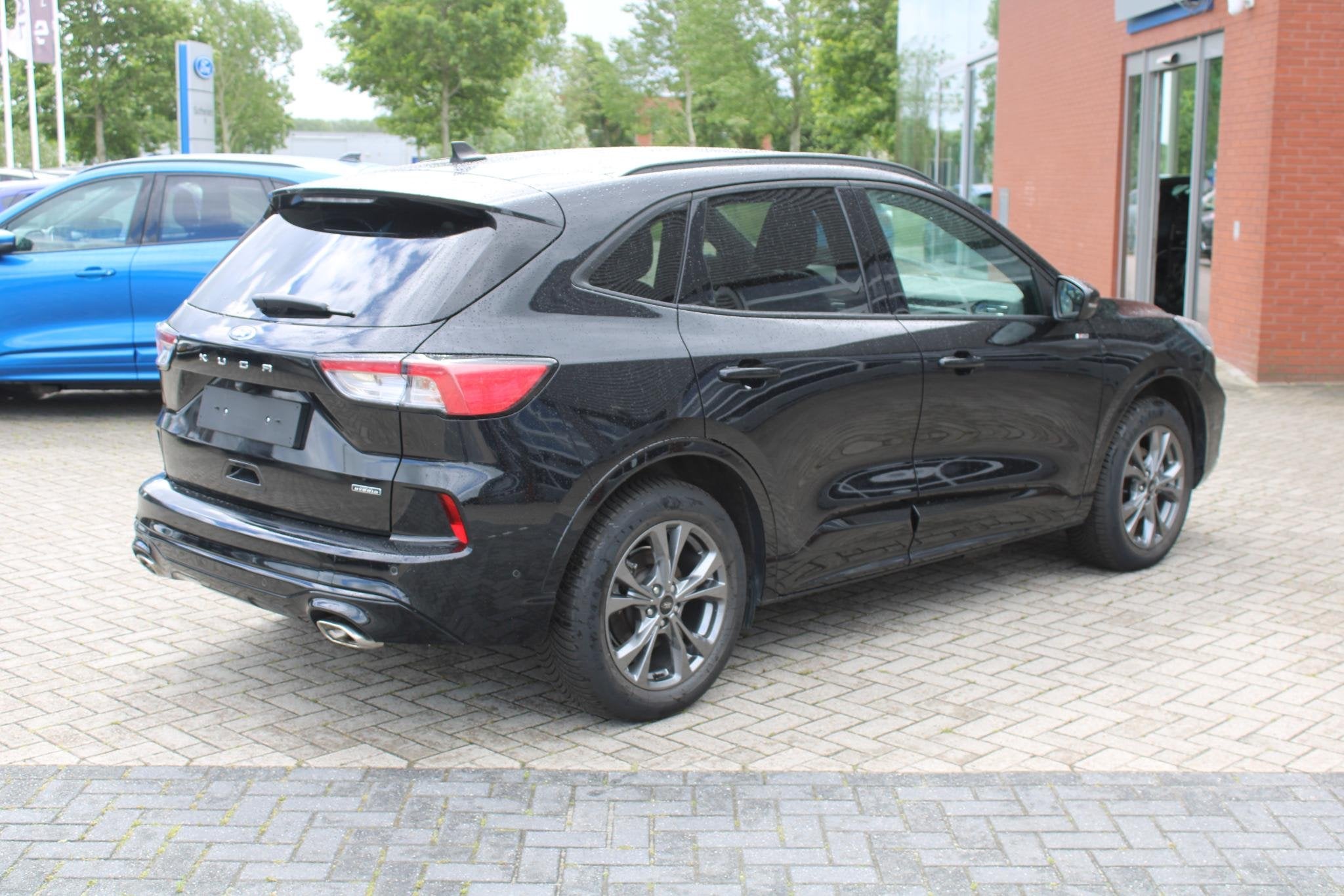 Ford Kuga 2.5 PHEV ST Line X 225 PK | 27.000 KM | Wegklapbar, Auto's, Ford, Gebruikt, 4 cilinders, Zwart, Plug-in hybride