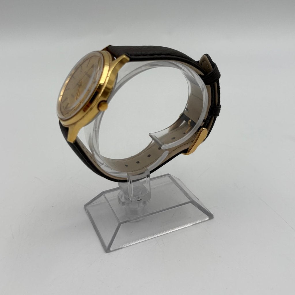 Dugena vintage horloge goudkleur lederen band, Flex Ltd., Zo goed als nieuw, https://flex.com/contact-us, Nobelstraat 10, 5807 GA Oostrum LB, Limburg, Nederland