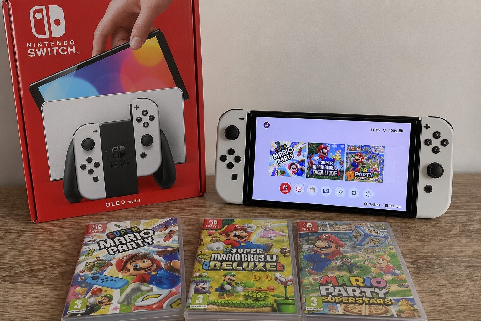 Nintendo Switch OLED met 3 Mario games, Spelcomputers en Games, Spelcomputers | Nintendo Switch, Zo goed als nieuw, Switch OLED