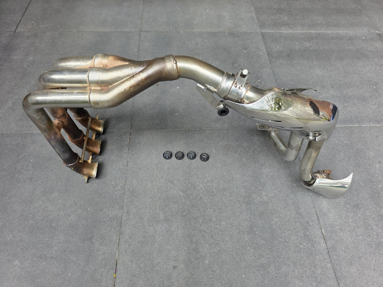 Originele uitlaat ex einddemper Speed Triple 1050 bij 05-10, Ophalen, Gebruikt