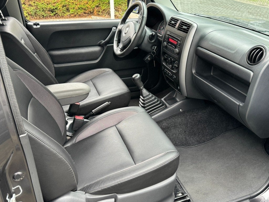 Suzuki JIMNY 1.3 Exclusive Metal Top 4x4 Airco/Leder/Trekhaa, Auto's, Euro 5, 86 pk, Met garantie (alle), 4 stoelen