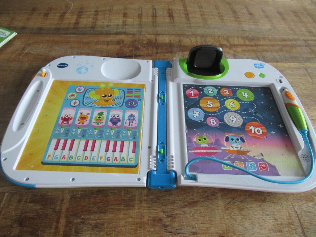 Als nieuw Vtech MAGI BOOK 3D. Met 6 boekjes niveau 1 en 2, Ophalen of Verzenden, Zo goed als nieuw