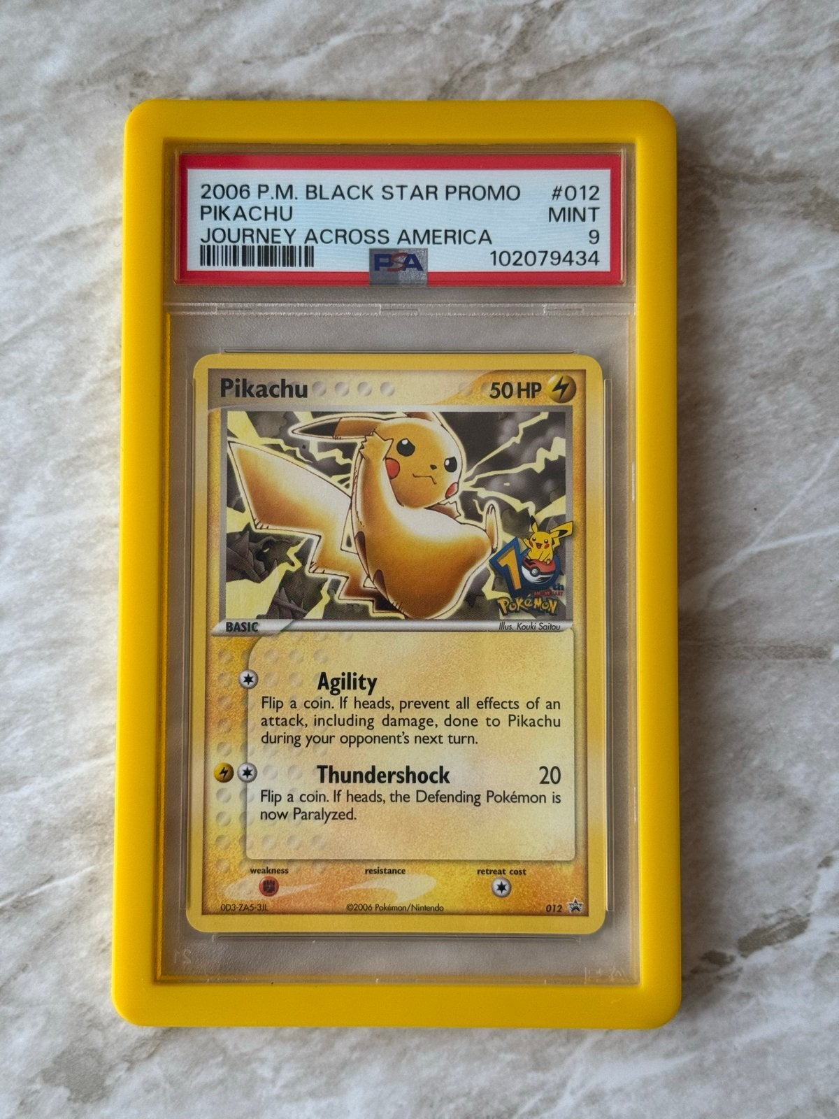 Pikachu 2006 P.M. Black Star Promo #012 PSA 9, Ophalen of Verzenden, Zo goed als nieuw, Losse kaart