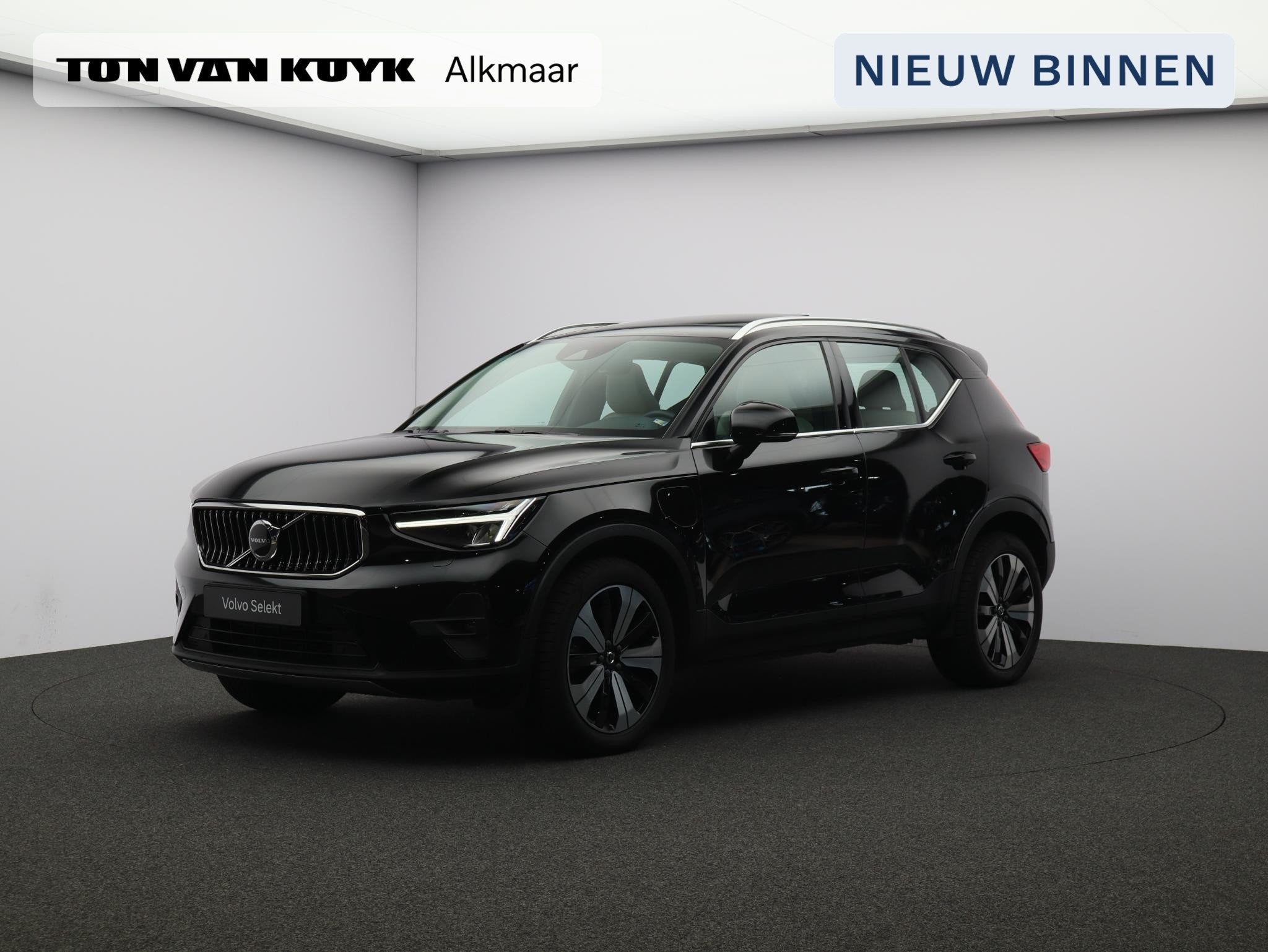 Volvo XC40 1.5 T4 Plug-in hybrid Plus Bright / Panoramadak /, Auto's, Stof, 1712 kg, Met garantie (alle), Zwart