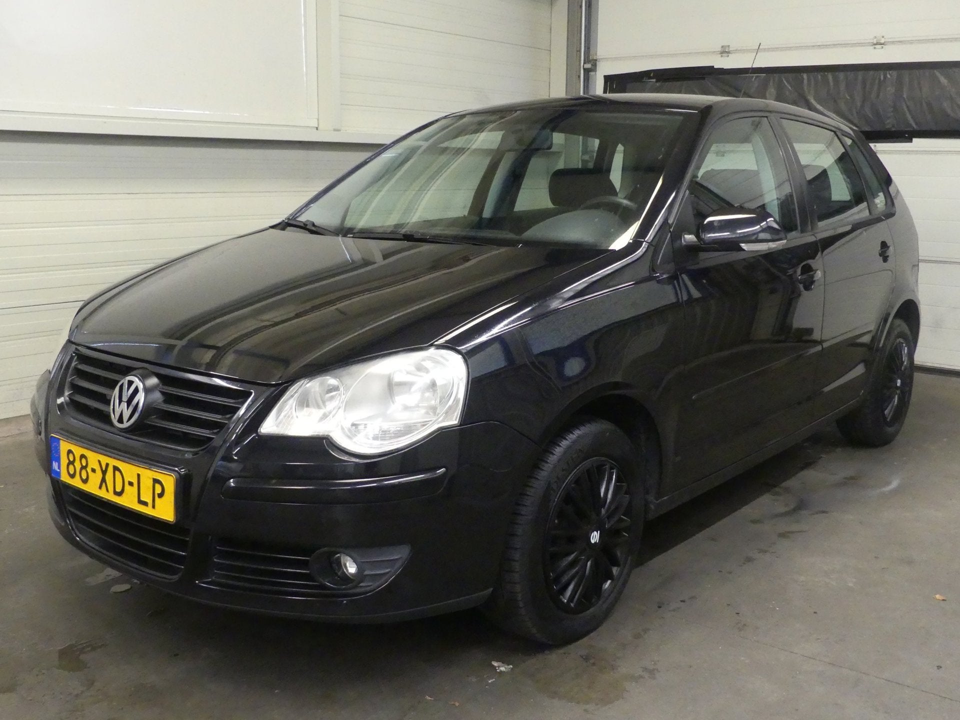 Volkswagen Polo 1.4-16V Optive - Airco - Keurig Onderhouden, Auto's, Voorwielaandrijving, Stof, Zwart, 4 cilinders