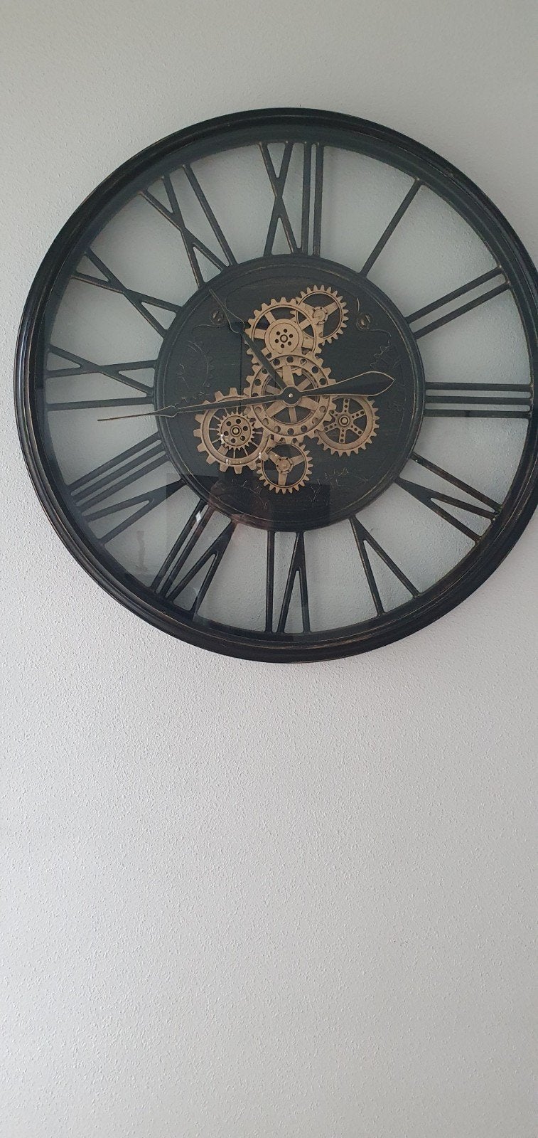 stoere wandklok, Ophalen