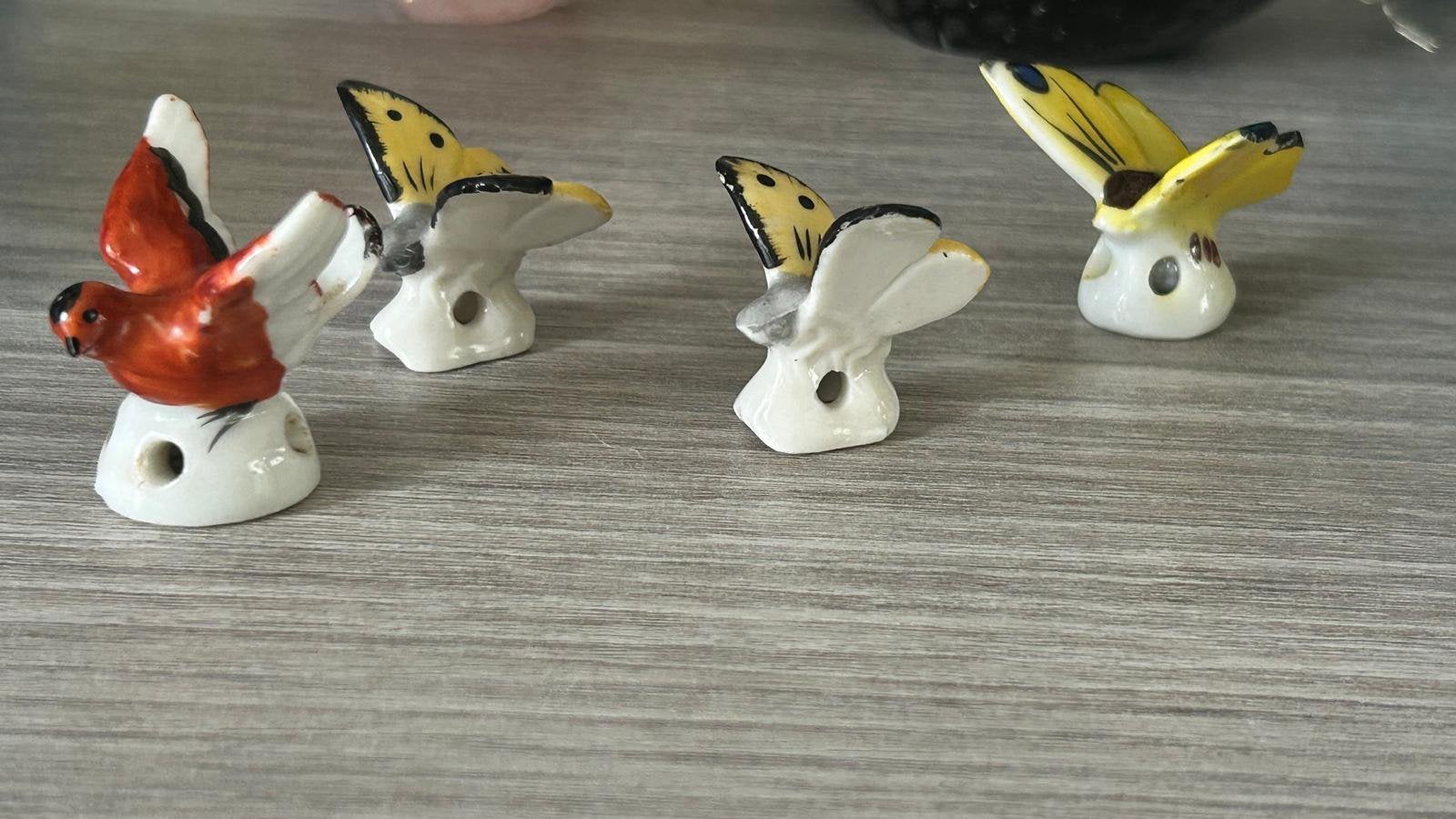 Decoratieve vogeltjes en vlinders van keramiek, Ophalen