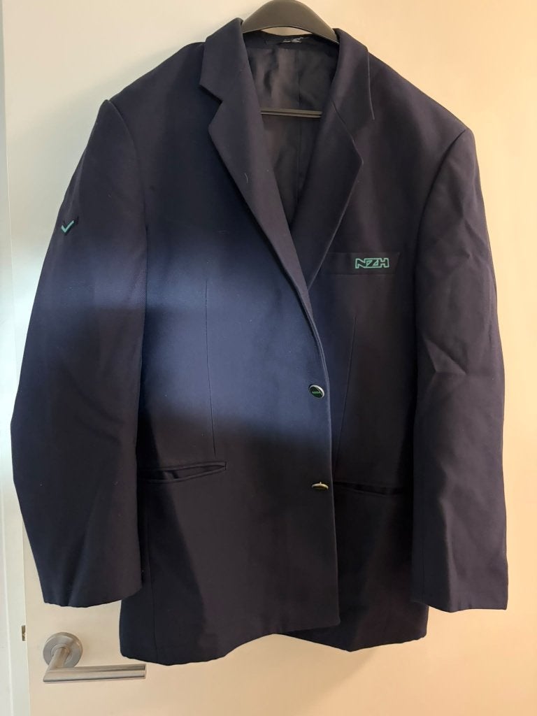 donker blauw colbert met een zh logo maat L, Ophalen, Zo goed als nieuw, Maat 52/54 (L), Blauw