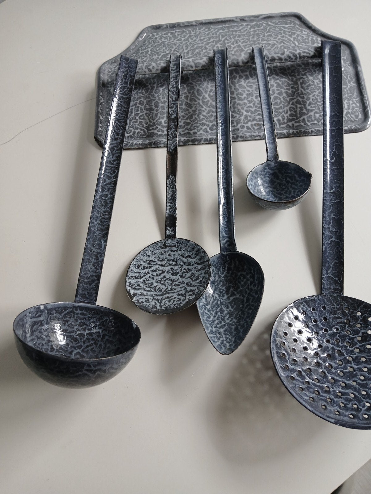 oud emaille lepel rek, Ophalen