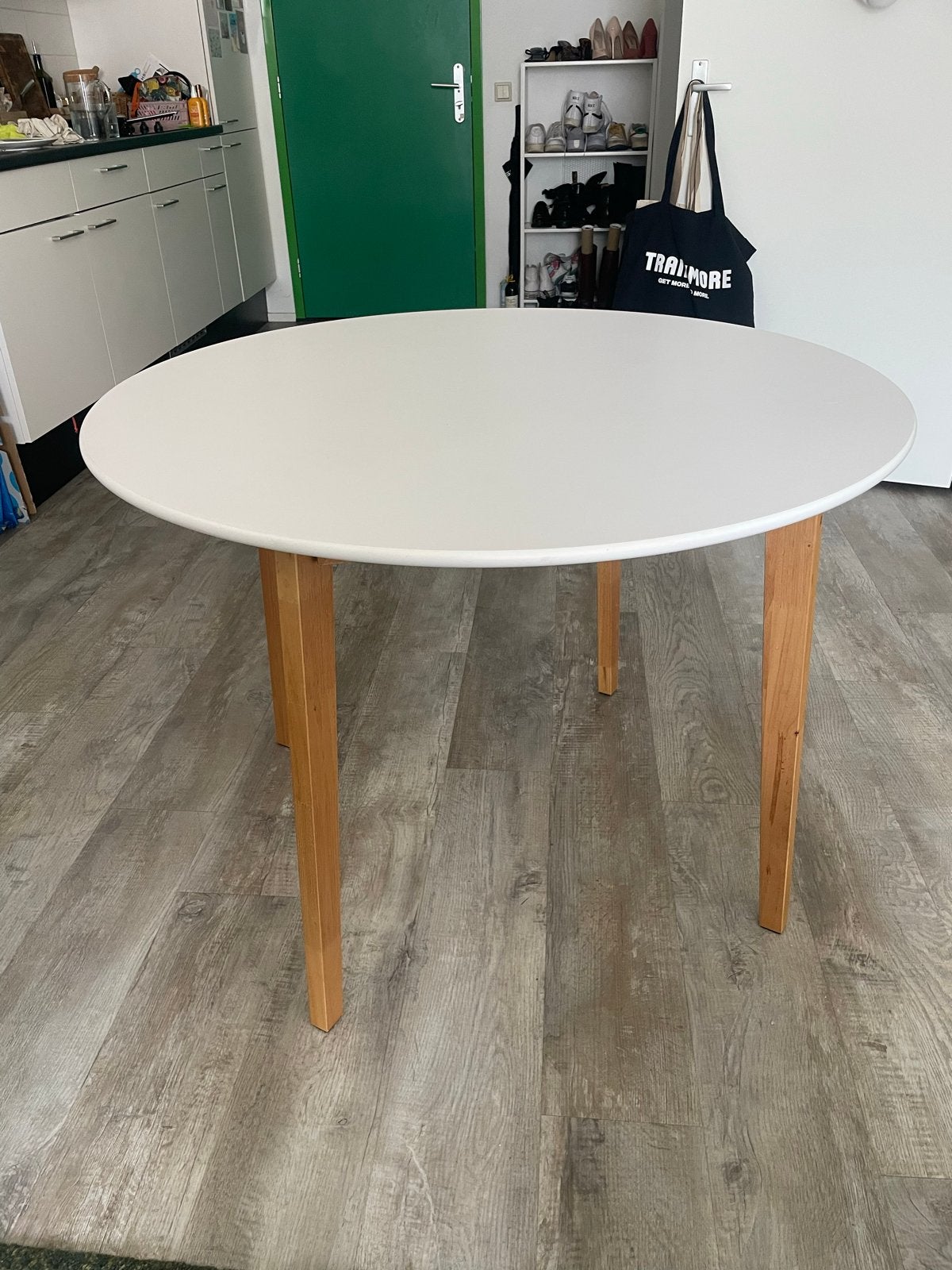 Witte ronde eettafel met houten poten, Huis en Inrichting, Ophalen, Gebruikt, 100 tot 150 cm, Rond