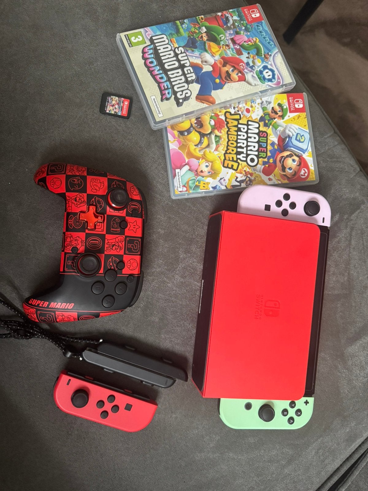 Nintendo Switch OLED Mario Red Edition incl 3 games