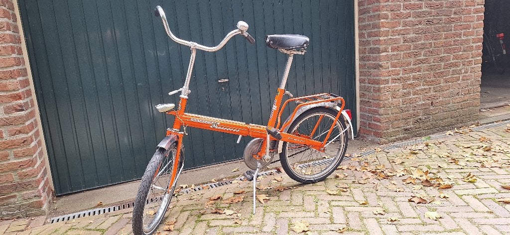 Retro opvouwbare fiets - Oranje vouwfiets, Fietsen en Brommers, Fietsen | Vouwfietsen, Ophalen, Gebruikt, Batavus, Totaal opvouwbaar