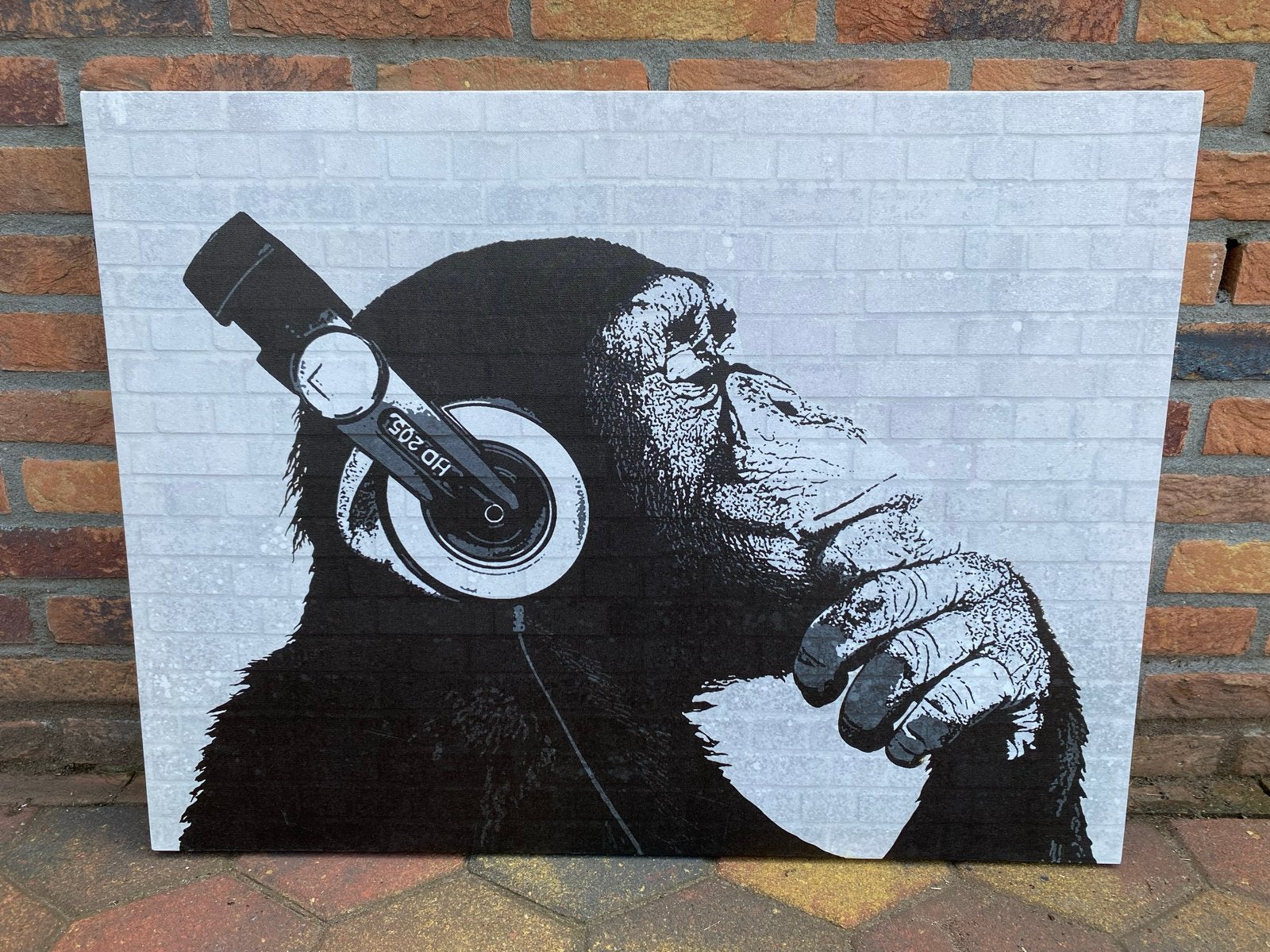 Canvas Aap met Koptelefoon - Zwart Wit - 80x60cm, Huis en Inrichting, Woonaccessoires | Schilderijen, Tekeningen en Foto's, Ophalen