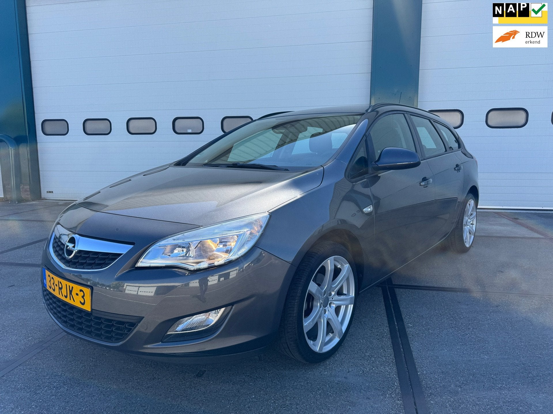 Opel Astra Sports Tourer 1.4 Edition, Auto's, Opel, Voorwielaandrijving, Euro 5, 4 cilinders, Origineel Nederlands