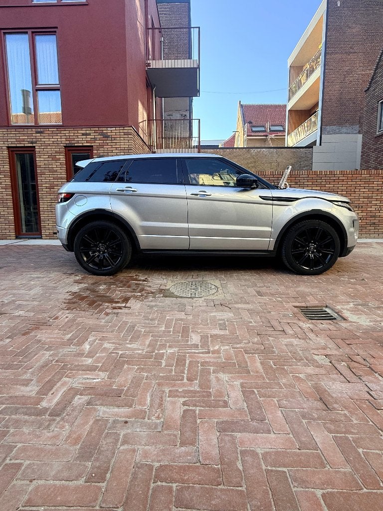 Land Rover Range Rover Evoque TD4 4WD AUT 2014 Grijs, Auto's, Automaat, 1800 kg, 4 cilinders, 1650 kg